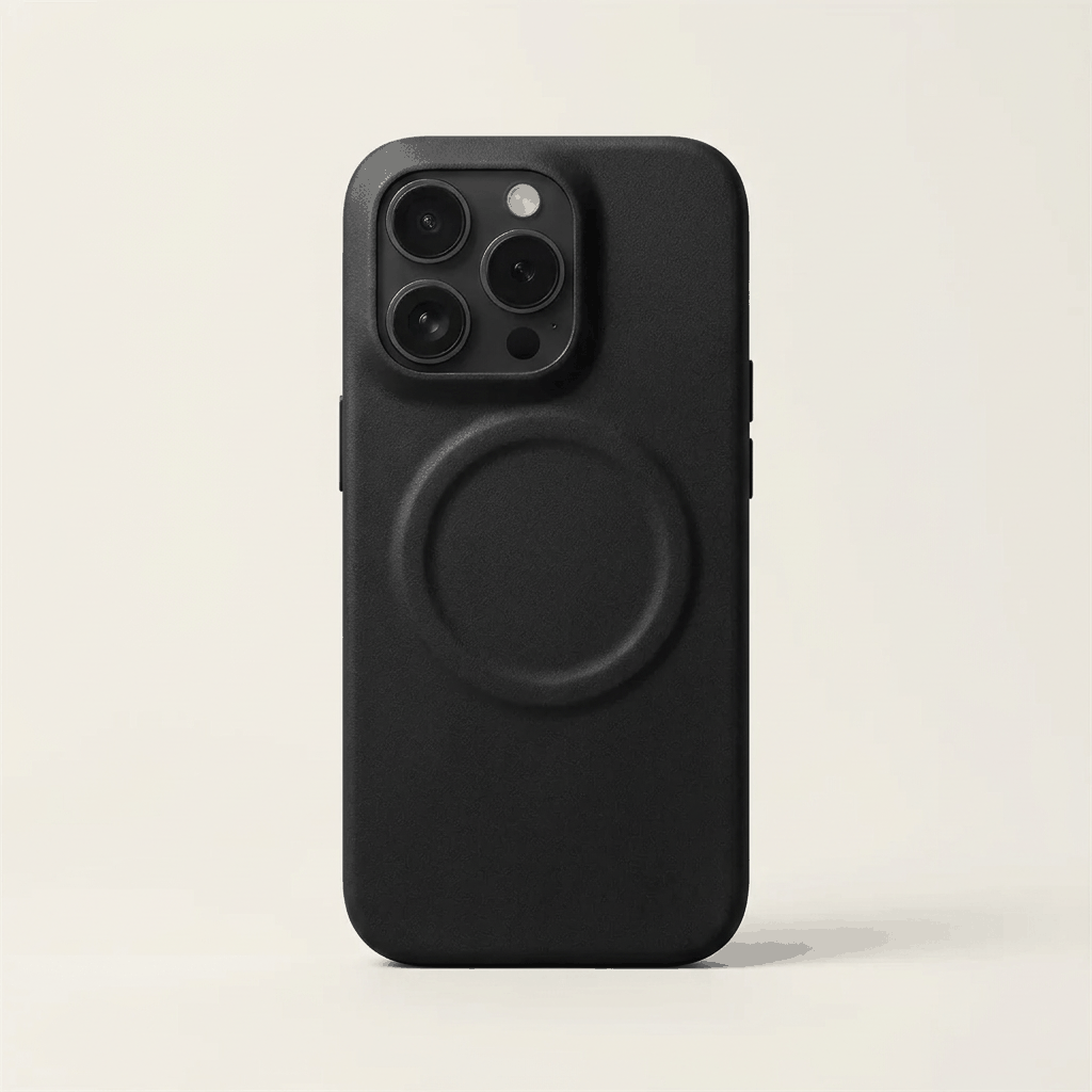 Apple iPhone case in black textured leather with a raised MagSafe ring and protective camera cutout