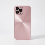 Apple iPhone case in blush pink with a smooth metallic radial finish and raised camera lens protection