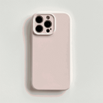 Apple iPhone case in pale blush pink with a smooth silicone finish and raised camera surround for lens protection