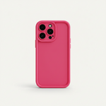 Apple iPhone silicone protective case in bright pink with a smooth matte finish and raised bumper around the camera cutout