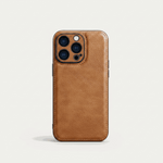 Apple iPhone leather case in warm tan brown, with a textured grain, stitched edges and raised camera surround.