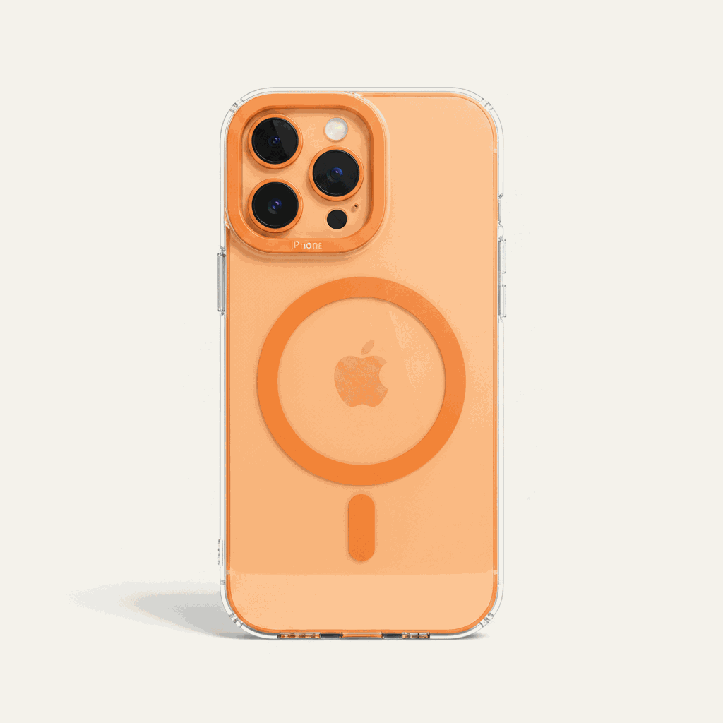 Apple iPhone in a clear case with an orange MagSafe ring, matching camera surround and slim transparent edges