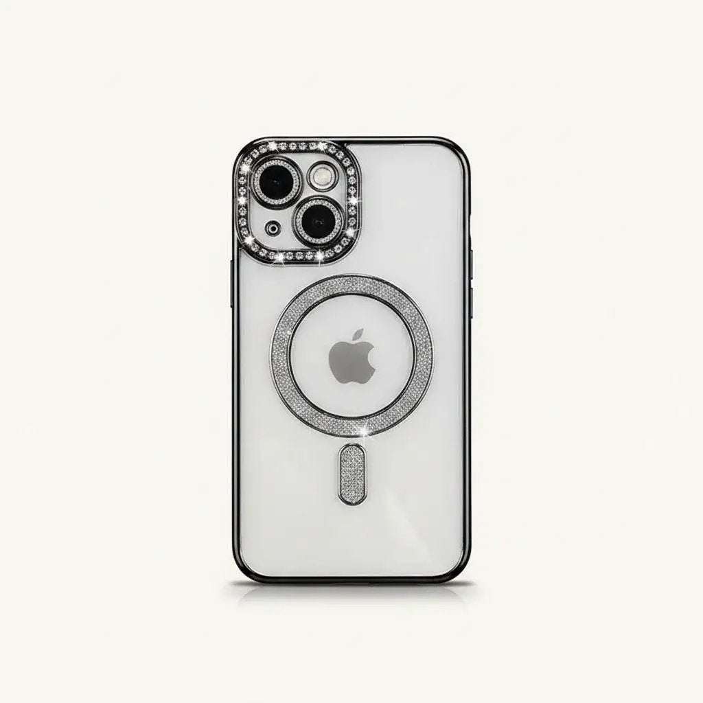 Apple iPhone case with a clear back, black bumper edges, and silver crystal accents around the camera and MagSafe ring
