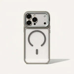Apple iPhone case in clear and gray with a raised camera guard and circular magnetic ring stand on the back