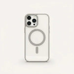 Apple iPhone clear hard MagSafe case with a transparent shell, silver-gray edges, and a visible circular magnetic ring