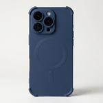 Apple iPhone case in dark blue matte finish, with raised corner bumpers and a circular MagSafe ring on the back