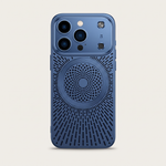 Apple iPhone case in dark blue with a textured finish, radiating ventilation slots, and a circular magnetic grid design