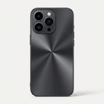 Apple iPhone case in dark charcoal with a smooth metallic finish and a striking radial starburst pattern across the back