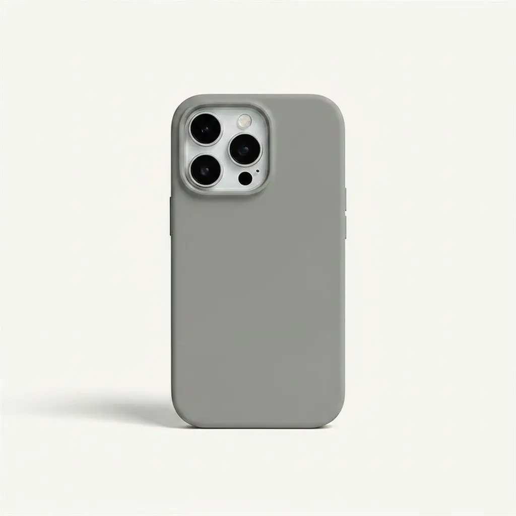Apple iPhone case in matte gray silicone with a smooth solid-color finish and raised camera opening for three lenses