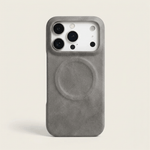 Apple iPhone case in textured grey leather with a raised circular MagSafe ring and protective camera cutout