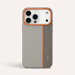 A gray and dark gray textured phone case with bright orange trim around the camera cutout and a vertical orange stripe, shown on a light gray background.