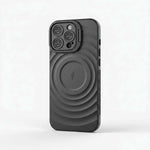 Apple iPhone case in matte black with a molded ripple pattern, raised camera surround and circular magnetic ring