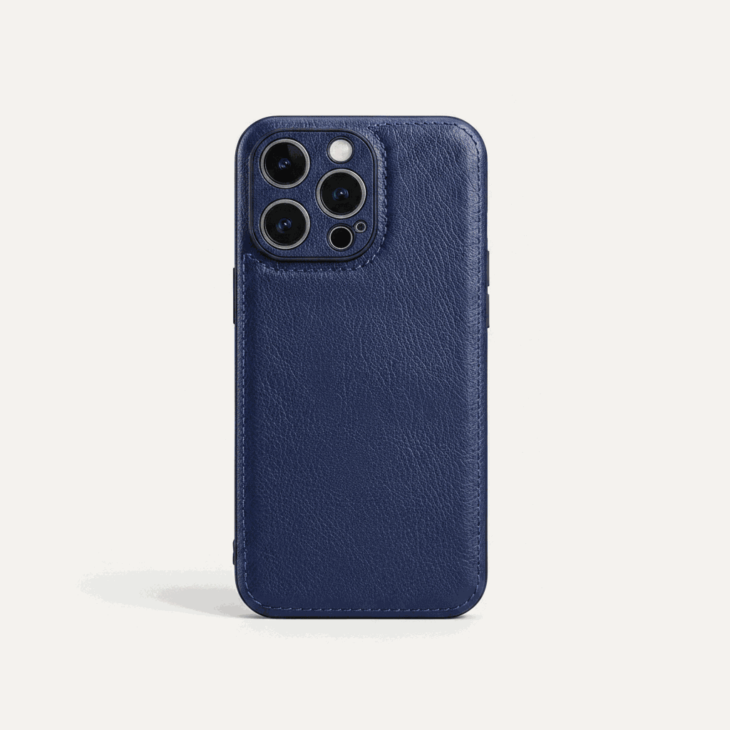 Apple iPhone leather case in deep navy blue with a fine textured surface, stitched edges and raised camera surround