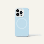 Apple iPhone case in pale blue with a smooth translucent finish, raised triple-camera cutout and circular MagSafe ring