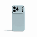 Apple iPhone silicone case in pale blue with a smooth finish, raised camera rim and precise lens cutouts