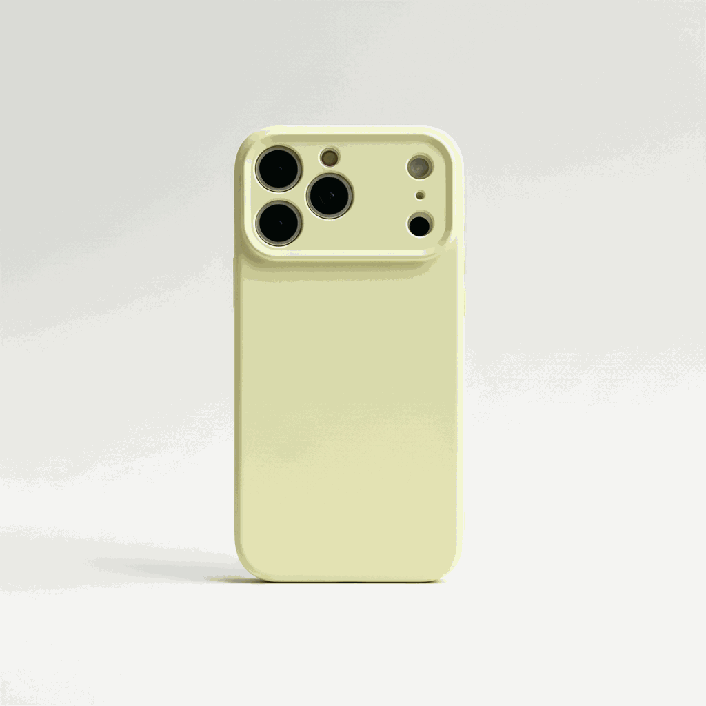 Apple iPhone silicone case in pale yellow with a smooth matte finish and raised camera-protecting edge