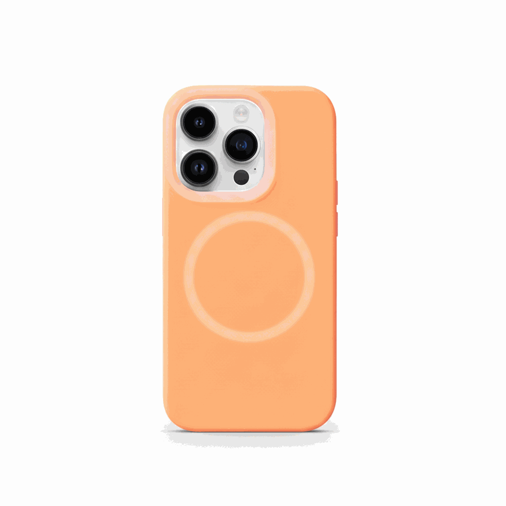 Apple iPhone case in soft peach-orange with a smooth finish, raised camera surround and visible MagSafe ring