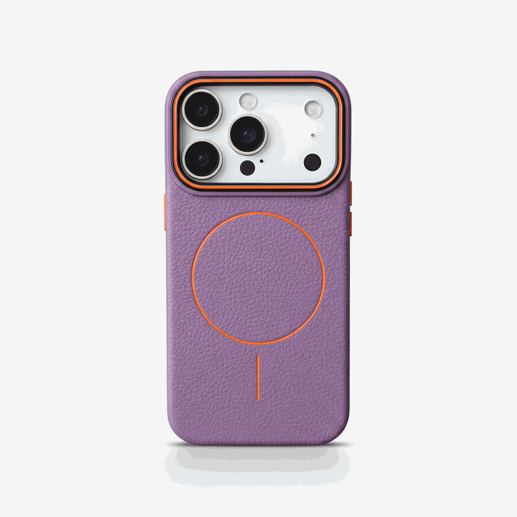Apple iPhone case in textured purple with orange trim, a circular MagSafe ring, and a raised camera surround