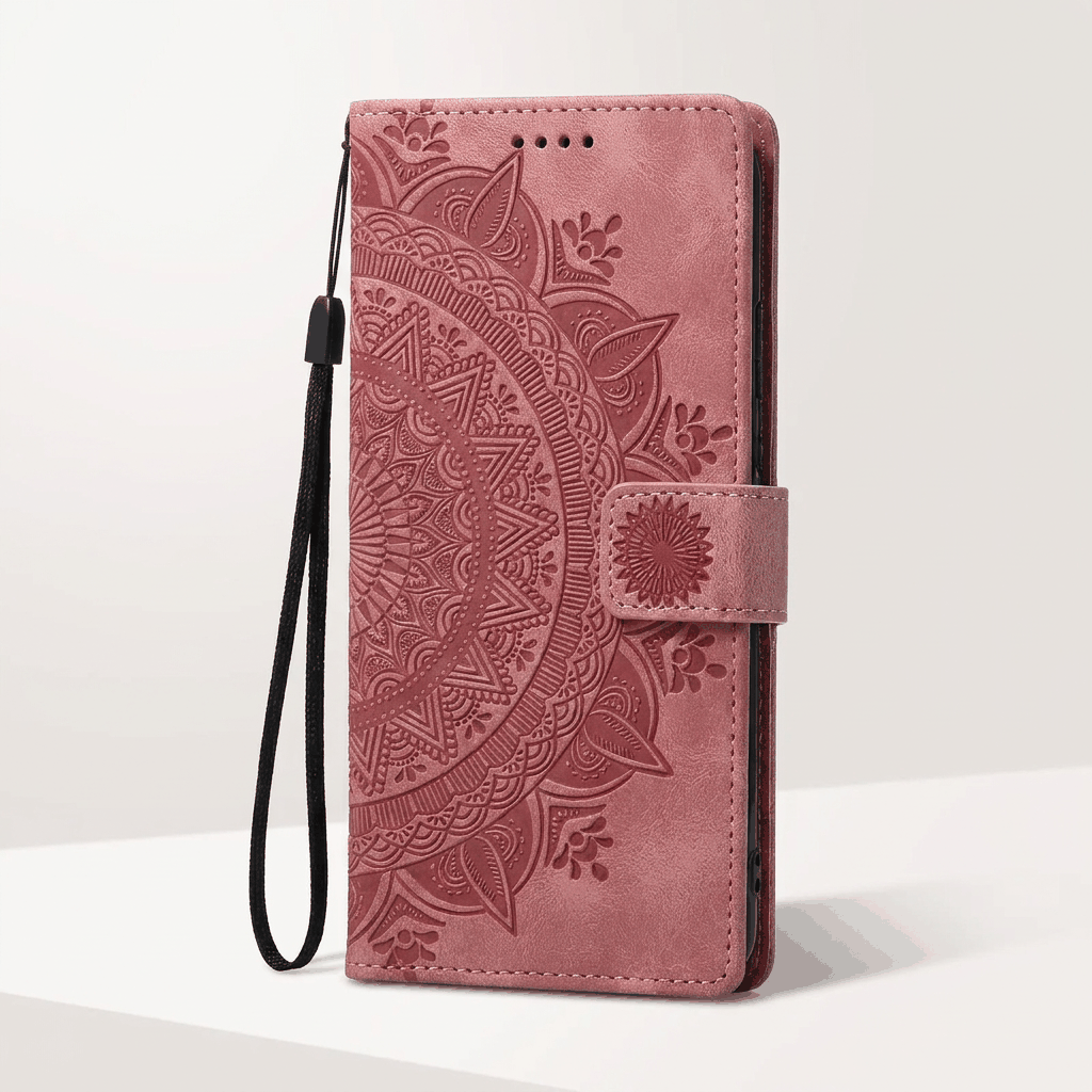 Apple iPhone wallet case in dusty rose embossed leather with ornate mandala pattern, magnetic strap and wrist loop