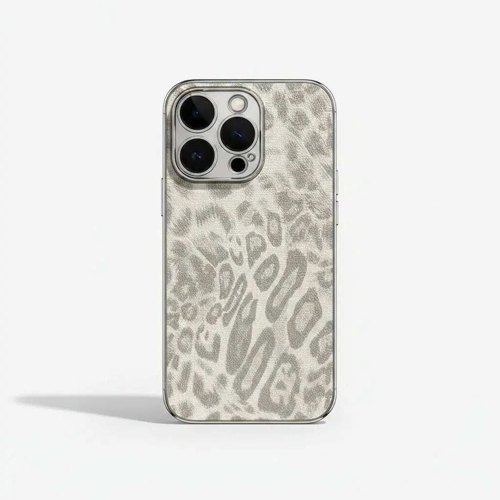 Apple iPhone case in silver-toned textured leopard print with a slim profile and raised protective camera rim
