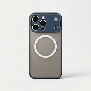Apple iPhone hard case in smoky gray with a matte back, dark blue edges, raised camera surround and white MagSafe ring