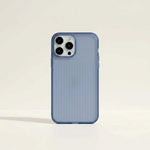 Apple iPhone case in translucent pale blue with a fine vertical stripe texture and dark blue raised camera edging