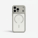 Apple iPhone case with a translucent frosted white back, grey reinforced edges and visible MagSafe ring