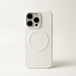 Apple iPhone case in smooth white leather with a raised circular MagSafe ring and protective camera surround