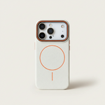 Apple iPhone case in textured white with orange MagSafe ring and matching camera rim, featuring a slim matte finish