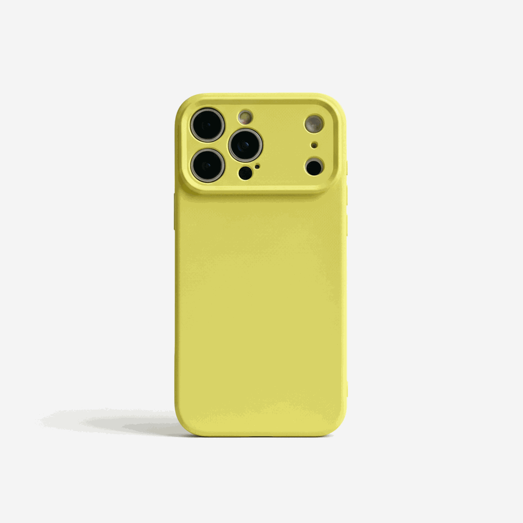 Apple iPhone case in bright yellow silicone with a smooth finish and raised camera protection around multiple lenses