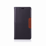 Google Pixel flip wallet case in textured dark purple material with stitched edges and a brown branded side tab