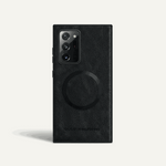 Samsung Galaxy rugged phone case in black textured leather-look material with a raised camera bezel and circular magnetic ring
