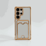 Samsung Galaxy clear silicone phone case with amber-gold reinforced edges, camera rim and built-in card pocket