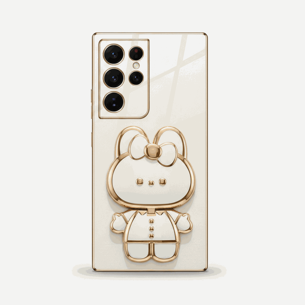 Samsung Galaxy phone case in glossy ivory with gold trim, featuring a raised bear character design and camera cutouts