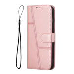 Samsung Galaxy flip wallet case in pale pink leather-look material, with stitched geometric panels, magnetic strap and wrist lanyard