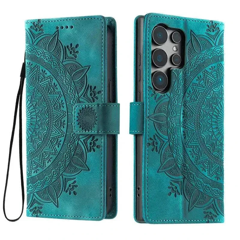 Samsung Galaxy wallet flip case in teal leather-look material with an embossed mandala pattern, strap closure and wrist loop