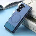 Samsung Galaxy Z Fold case in blue textured leather with a circular magnetic ring and raised triple-camera rim