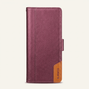 Samsung Galaxy Z Fold wallet case in burgundy textured leather with stitched edges and a tan corner accent