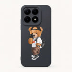 Xiaomi Fun Art Soft Silicone Case in charcoal black with a smooth finish and a cartoon bear wearing a cap and holding a phone