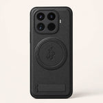 Xiaomi Leather Look Phone Case in black textured leather-look material with a stitched circular magnetic ring and lower hinge detail