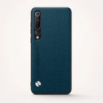 Phone case, Xiaomi Mi 10 Luxury, dark teal textured leather-look finish with a vertical camera cutout and silver button
