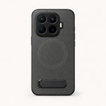 Xiaomi Textured Magnetic Bracket Phone Case in dark gray with a woven-look crosshatch finish, raised camera edges and folding stand